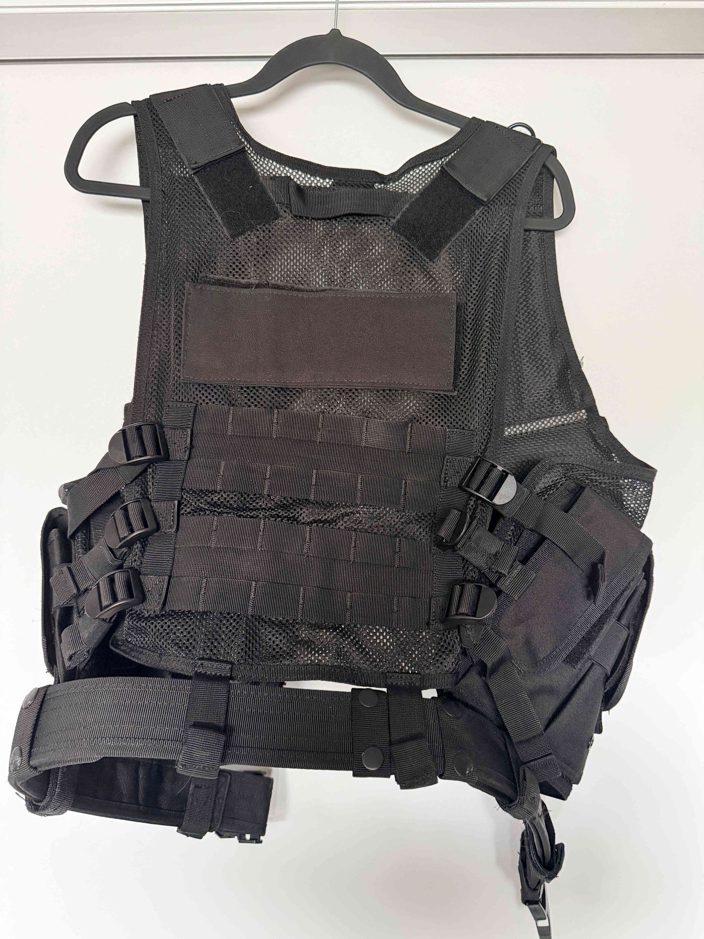 Tactical mesh vest MOLLE attachment points close-up