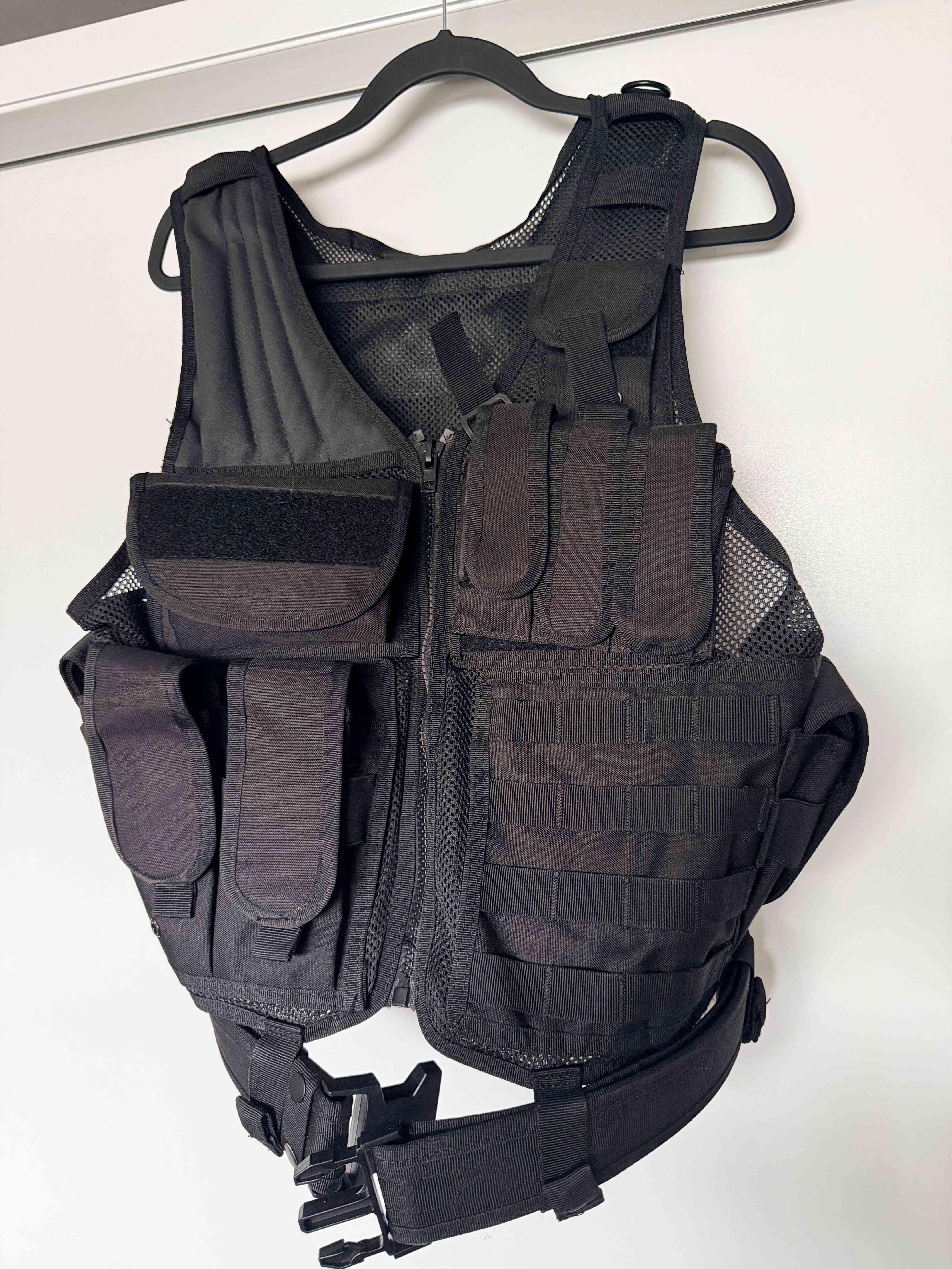 Black tactical vest front zip and pouch detail – RedSpear Armory