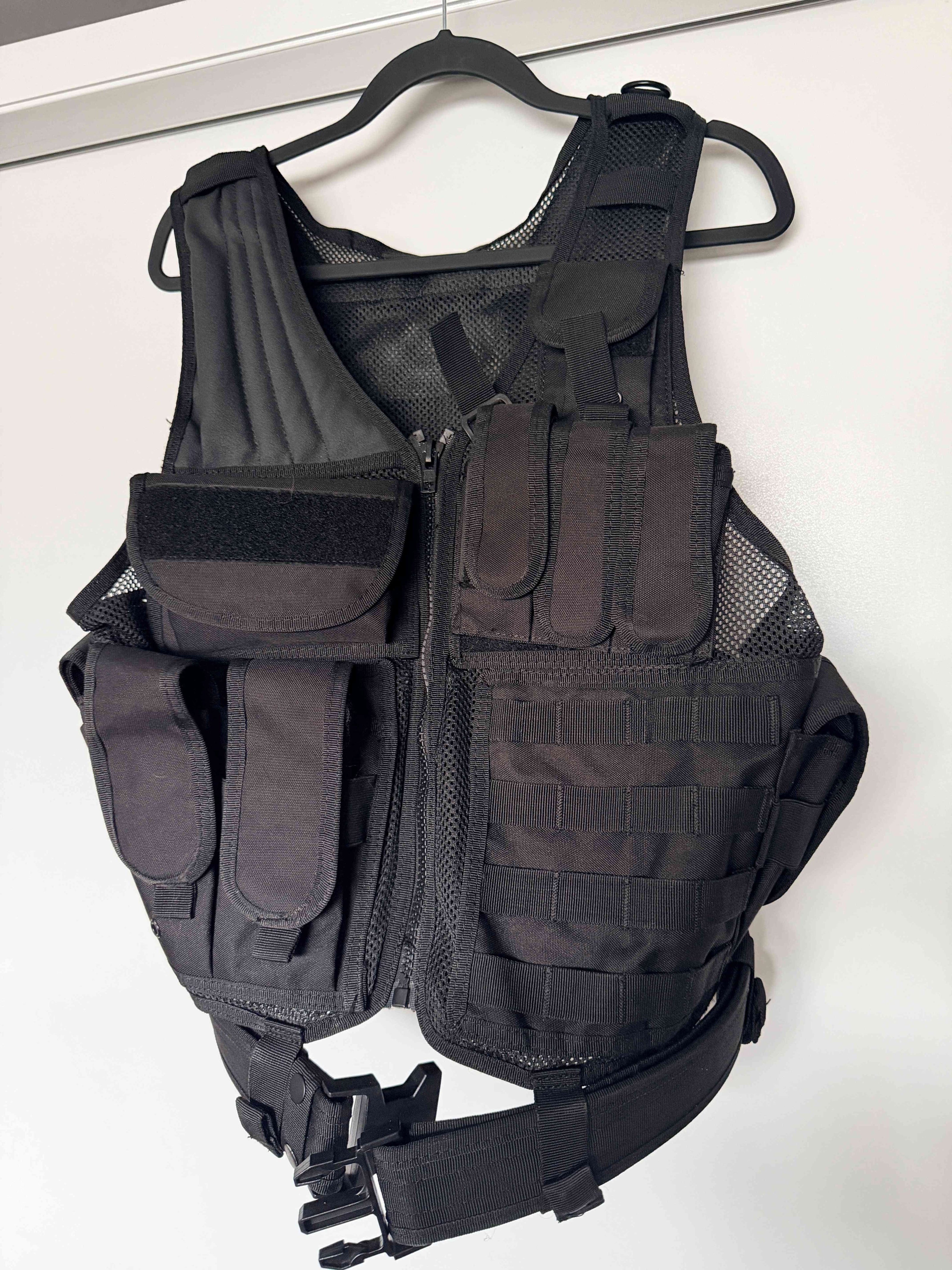 Black tactical vest front zip and pouch detail – RedSpear Armory